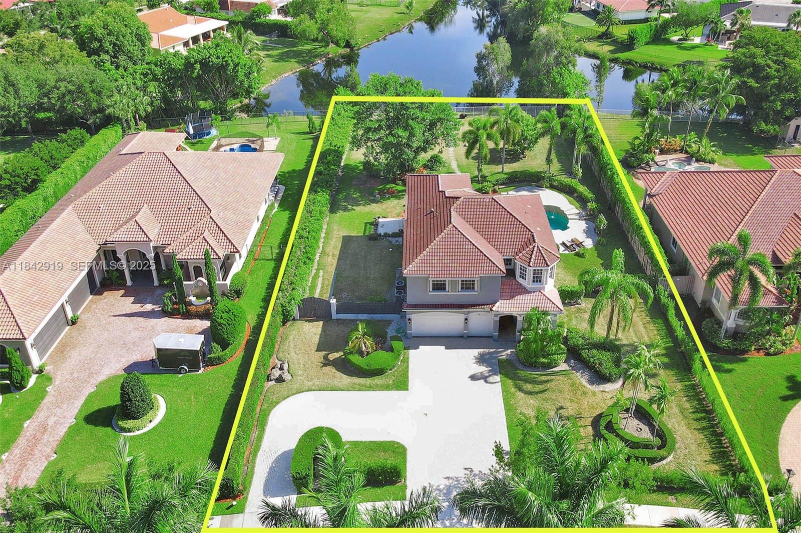 721 Ranch Road Weston, FL 33326 - Photo 9 of 38 an aerial view of a house with outdoor space and a swimming pool