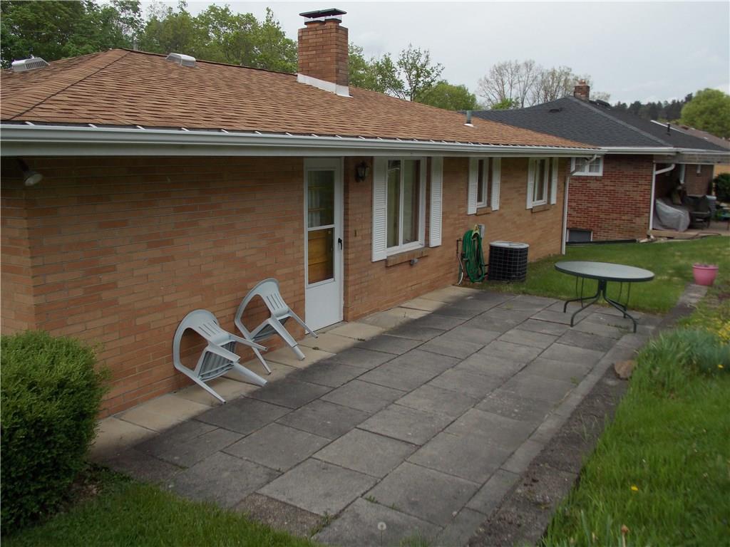 1374 Sunnybrook Road Washington, PA 15301 - Photo 3 of 25 Back patio is ready for our imagination or just use it for a sunny spot to enjoy.