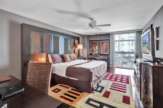 a kitchen with a refrigerator and cabinets