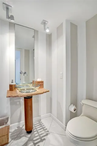 a bedroom with a bed and dresser