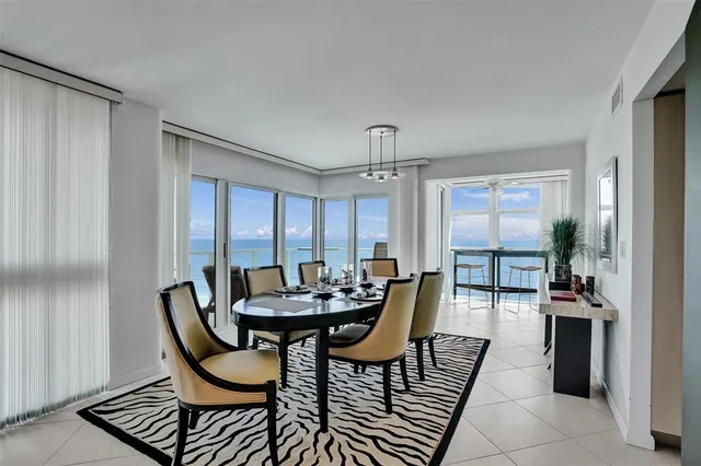 a kitchen with a sink stove and refrigerator