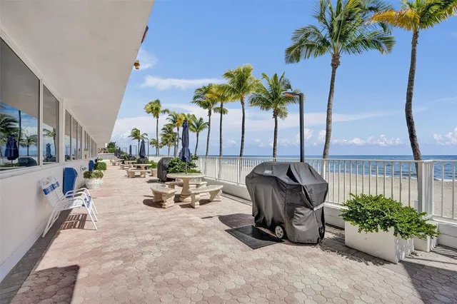a room with gym equipment and a view of living room
