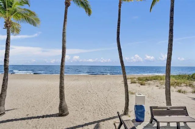a view of a living room and dining room