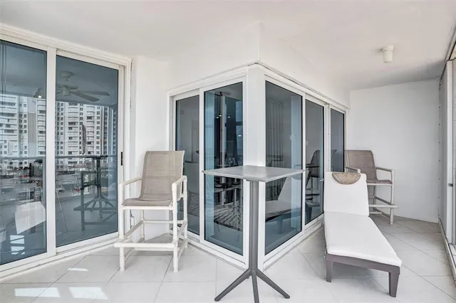 a view of water heater and wooden floor