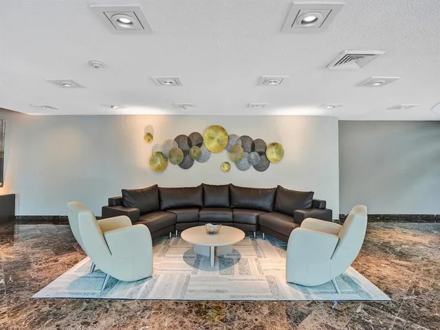 a street sign on a street next to a building