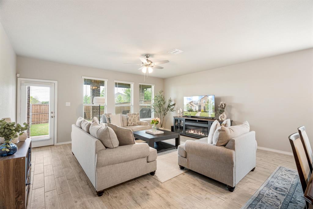 321 Pasture Drive Midlothian, TX 76065 - Photo 2 of 40 a living room with furniture and a large window
