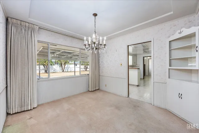 a view of a chandelier and entryway