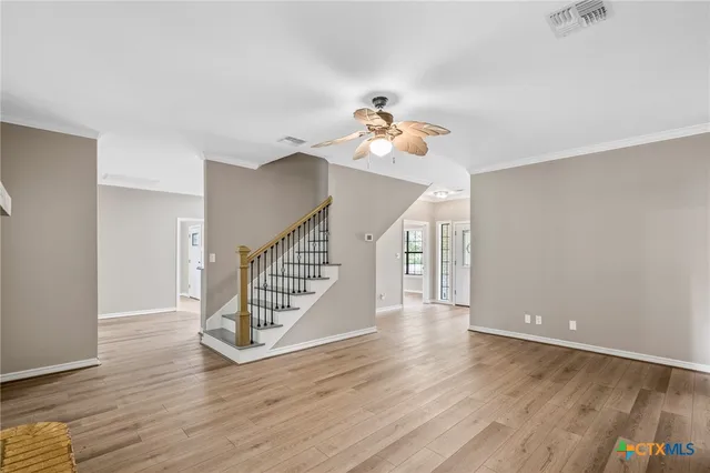 a view of entryway with wooden floor