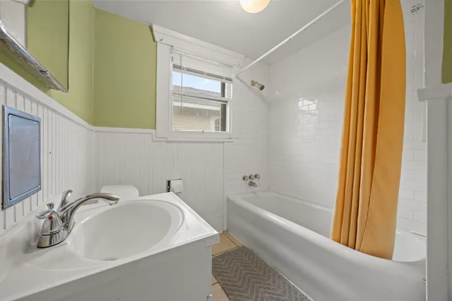 a bathroom with a sink and a bathtub