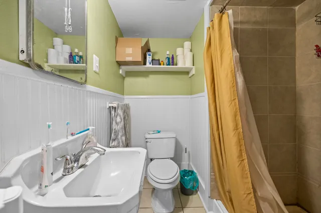 a bathroom with a sink and a toilet