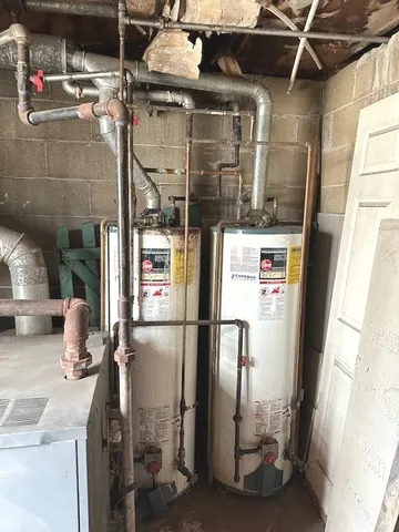 a kitchen with a refrigerator and a sink