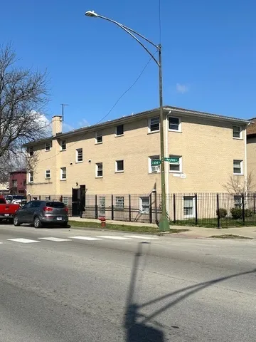 a view of a building with a street