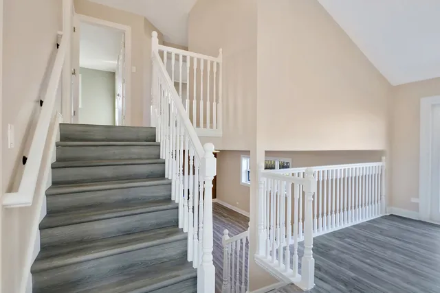 a view of entryway with wooden floor