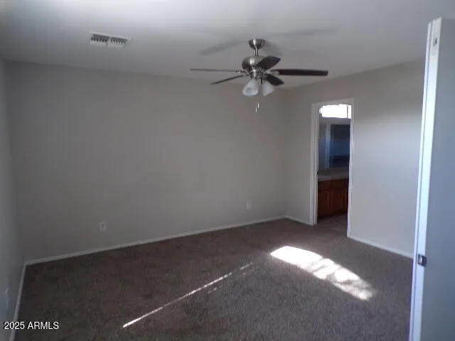 an empty room with a empty space and a window