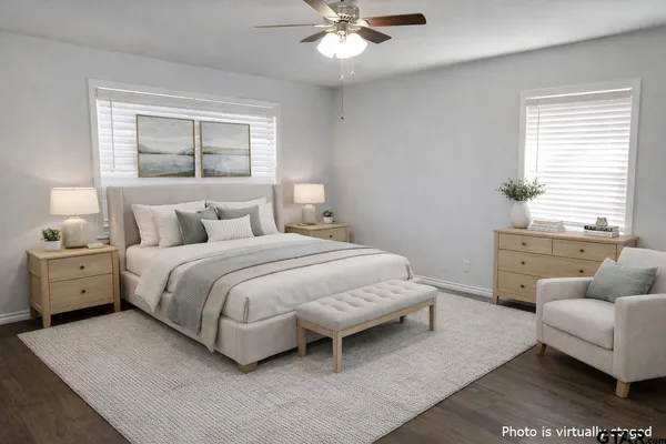 a bedroom with a bed and a couch