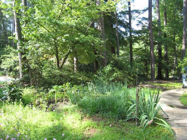 4612 Fernham Place Raleigh, NC 27612 - Photo 8 of 8 a view of yard with green space