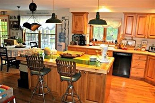 272 Old Hardwick Road Barre, MA 01005 - Photo 12 of 30 a view of a dining room with furniture and chandelier