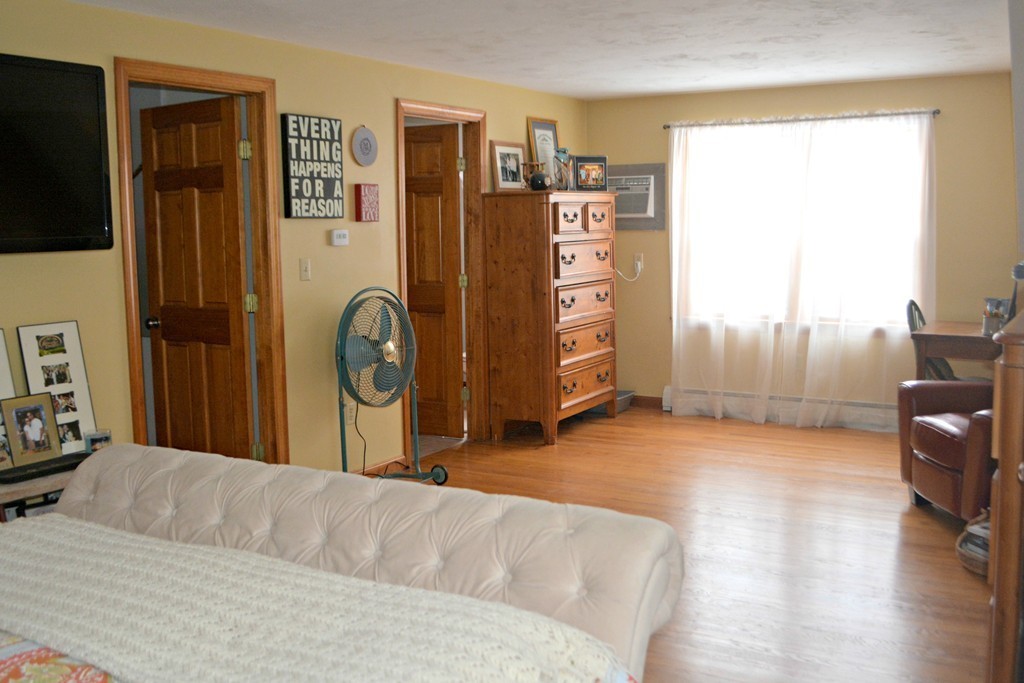 272 Old Hardwick Road Barre, MA 01005 - Photo 21 of 30 a bedroom with furniture and a flat screen tv