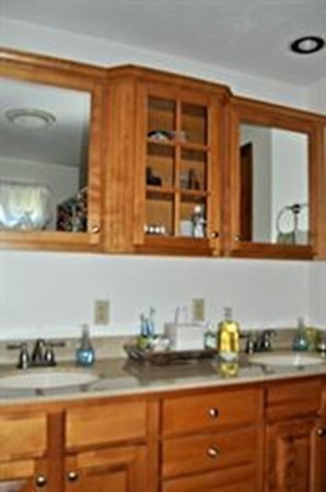 272 Old Hardwick Road Barre, MA 01005 - Photo 22 of 30 a bathroom with a granite countertop sink and a mirror