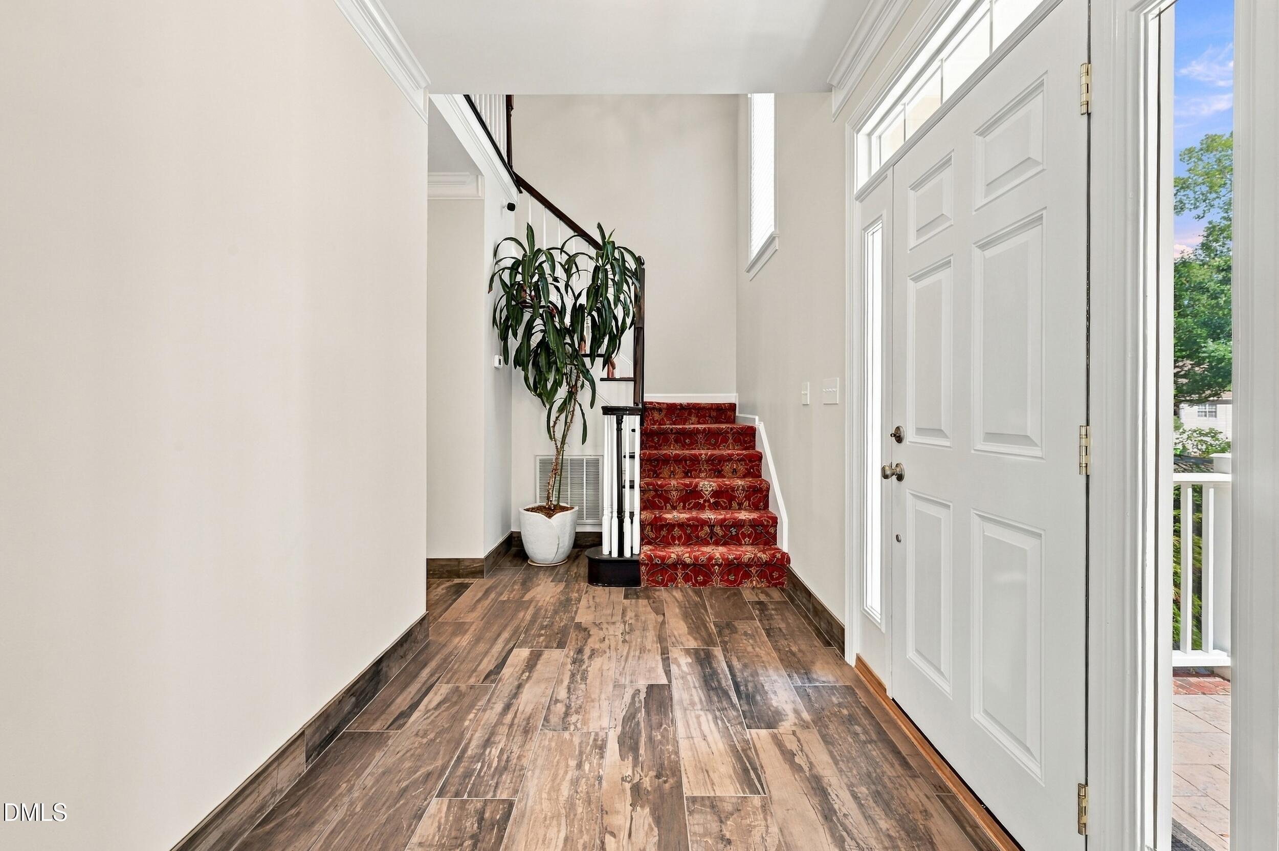 8505 Bluff Pointe Court Raleigh, NC 27615 - Photo 3 of 39 Tile entry