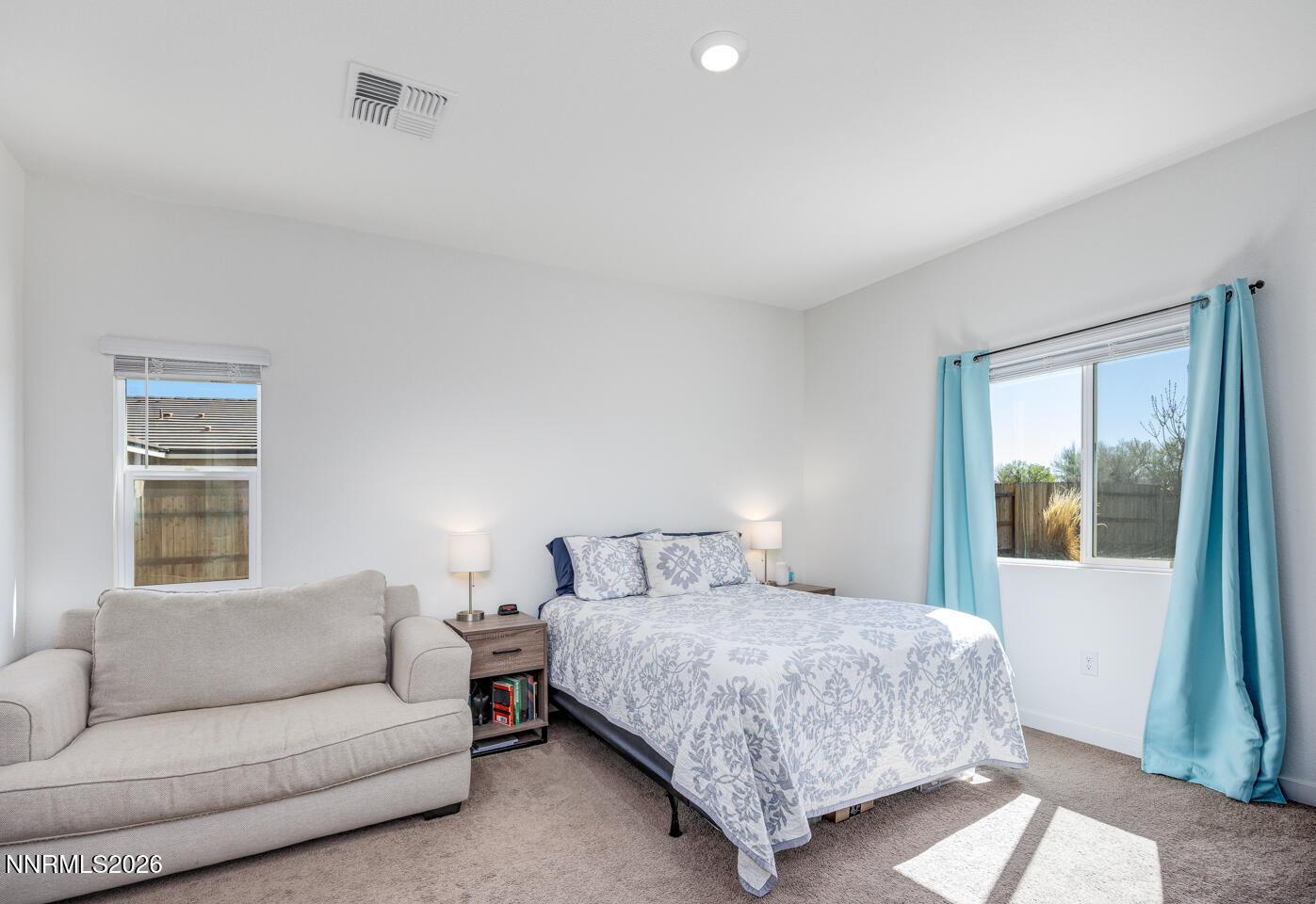 1135 Tamarack Drive Fallon, NV 89406 - Photo 11 of 23 a bedroom with a bed and a couch
