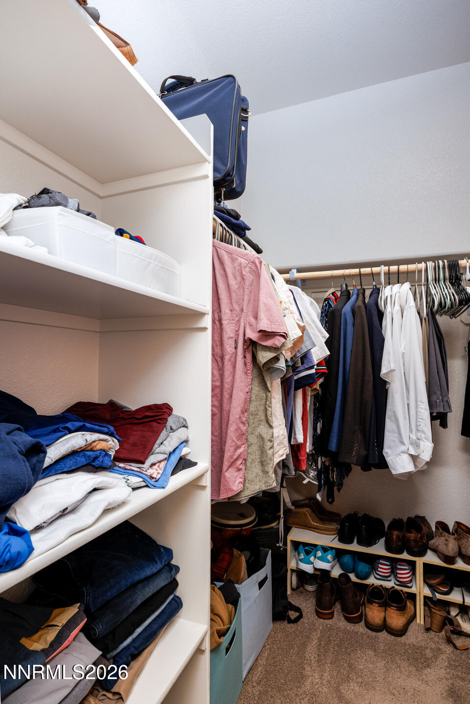 1135 Tamarack Drive Fallon, NV 89406 - Photo 13 of 23 a view of walk in closet with clothes and shoes