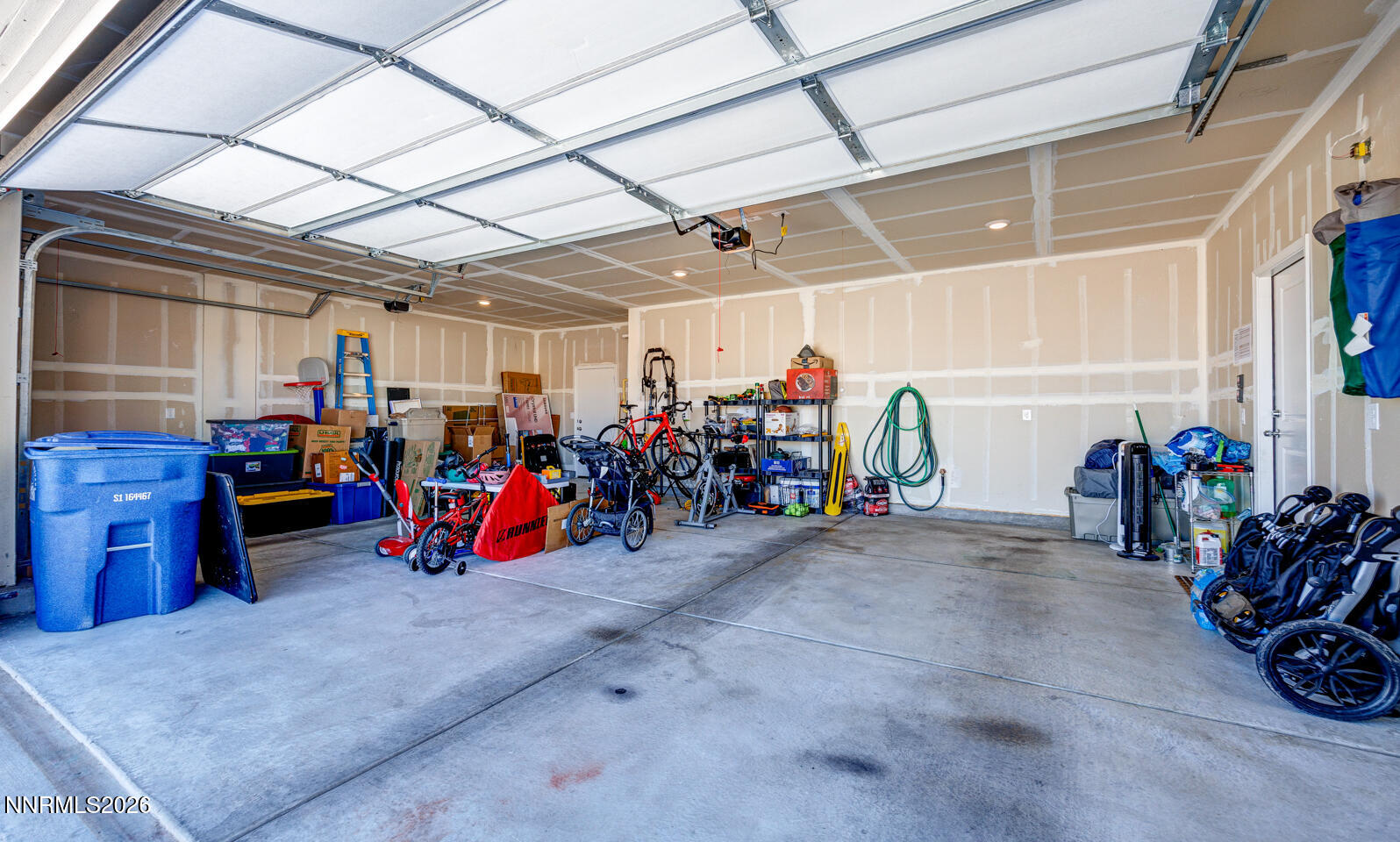 1135 Tamarack Drive Fallon, NV 89406 - Photo 15 of 23 a view of a storage room with a lot of stuff