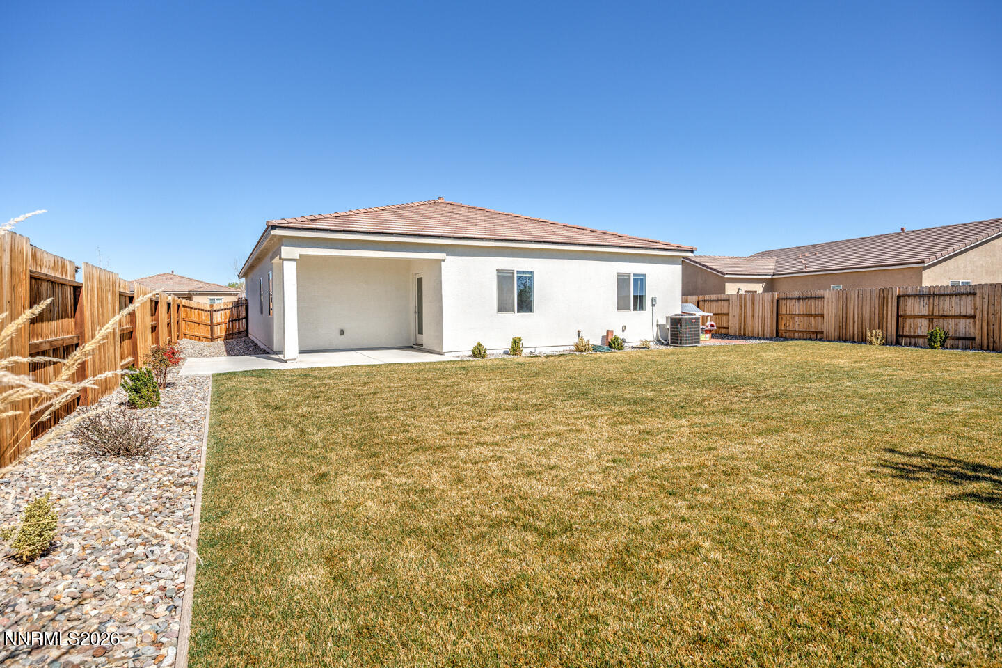 1135 Tamarack Drive Fallon, NV 89406 - Photo 17 of 23 a view of a house with a yard