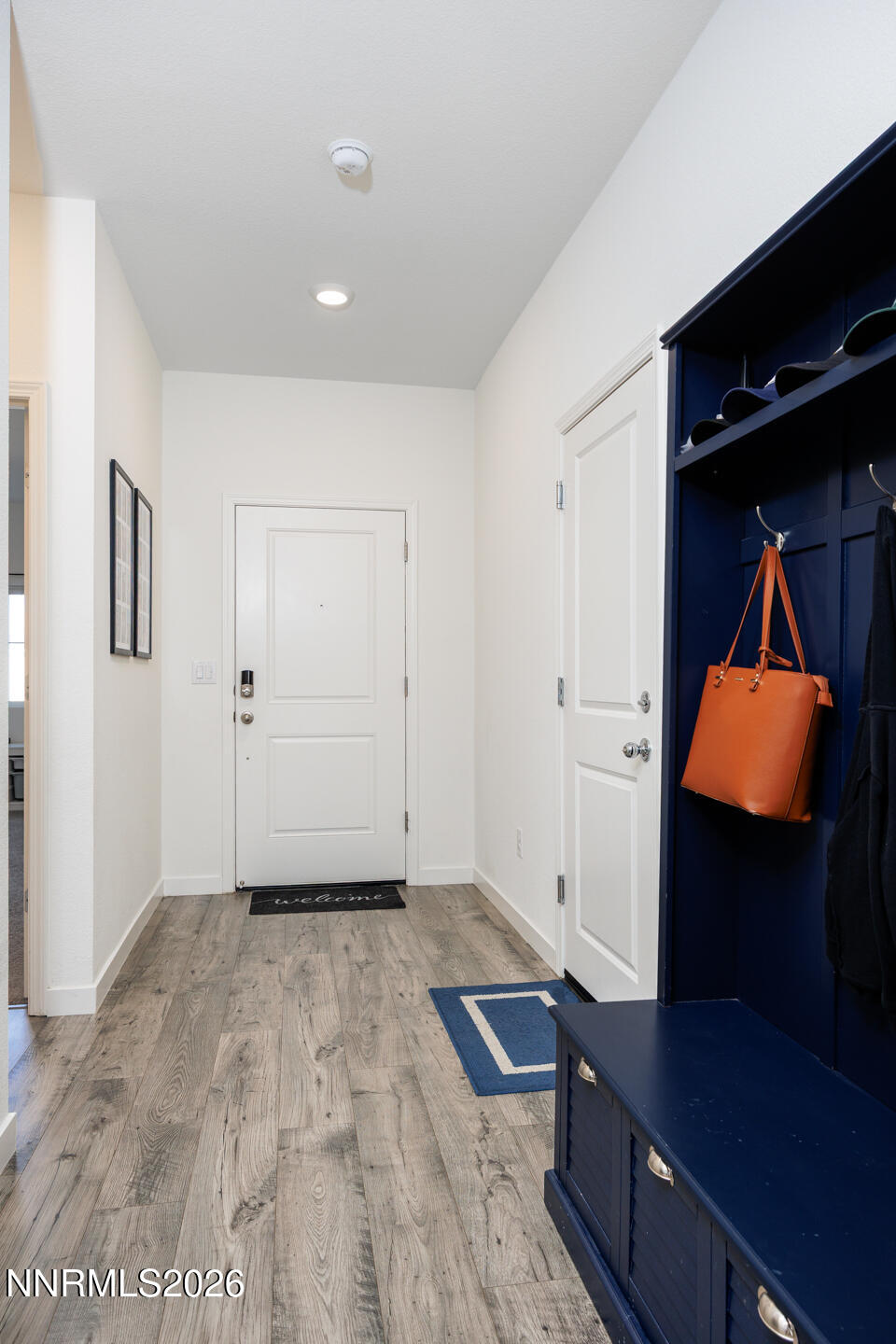 1135 Tamarack Drive Fallon, NV 89406 - Photo 3 of 23 a view of room with wooden floor and cabinet