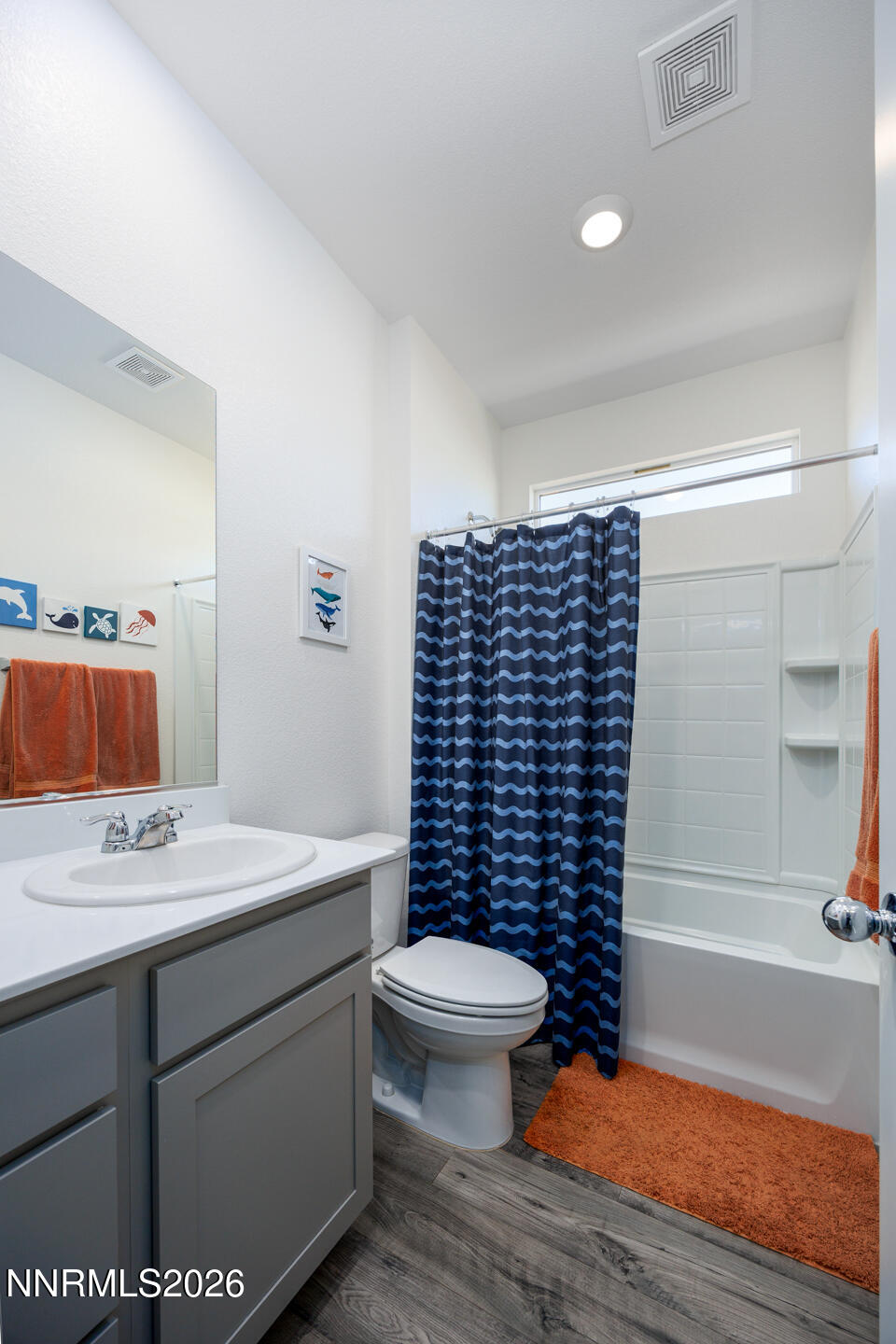 1135 Tamarack Drive Fallon, NV 89406 - Photo 10 of 23 a bathroom with a sink a toilet and shower