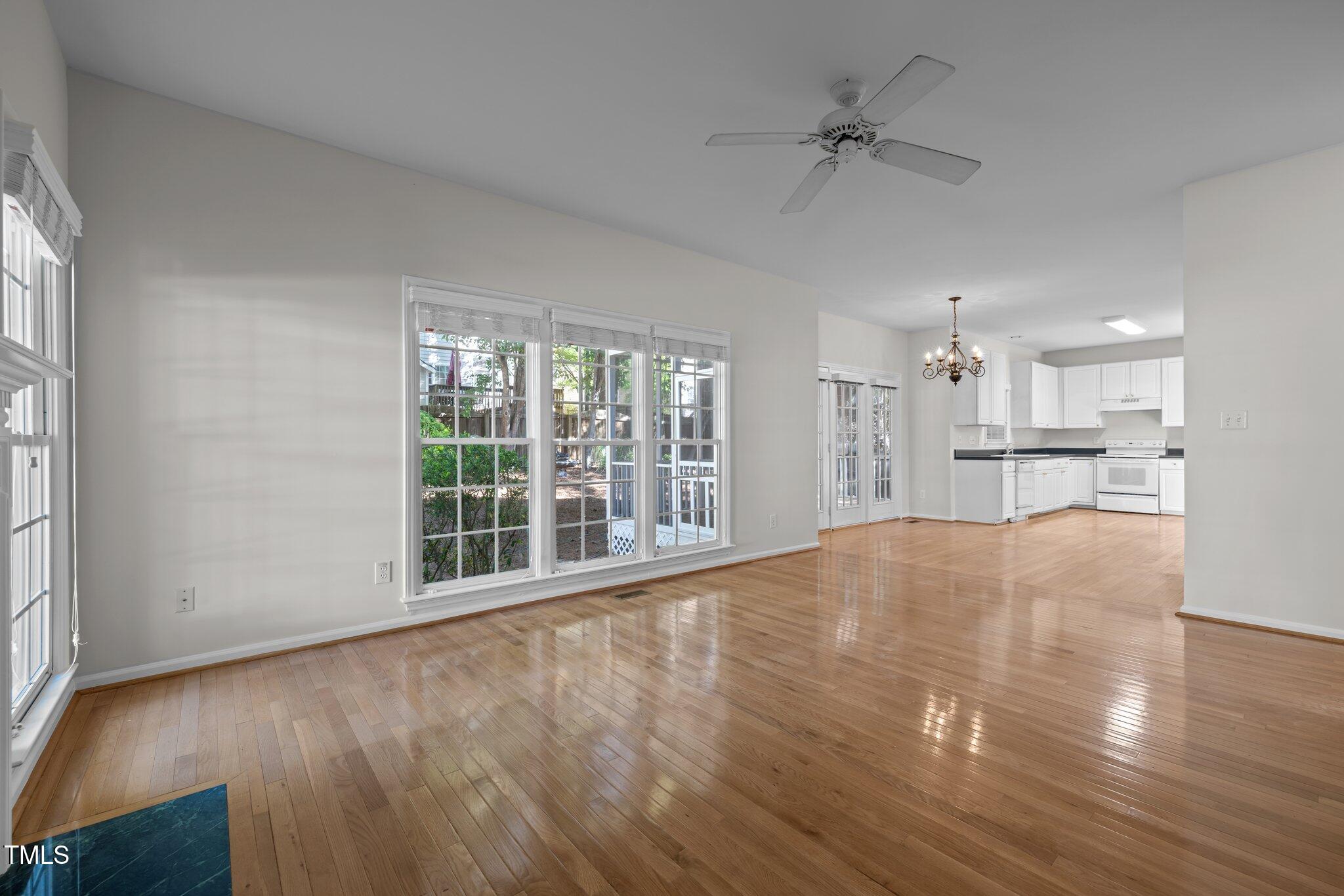 2309 Clerestory Place Raleigh, NC 27615 - Photo 11 of 37 a view of large windows with a kitchen area