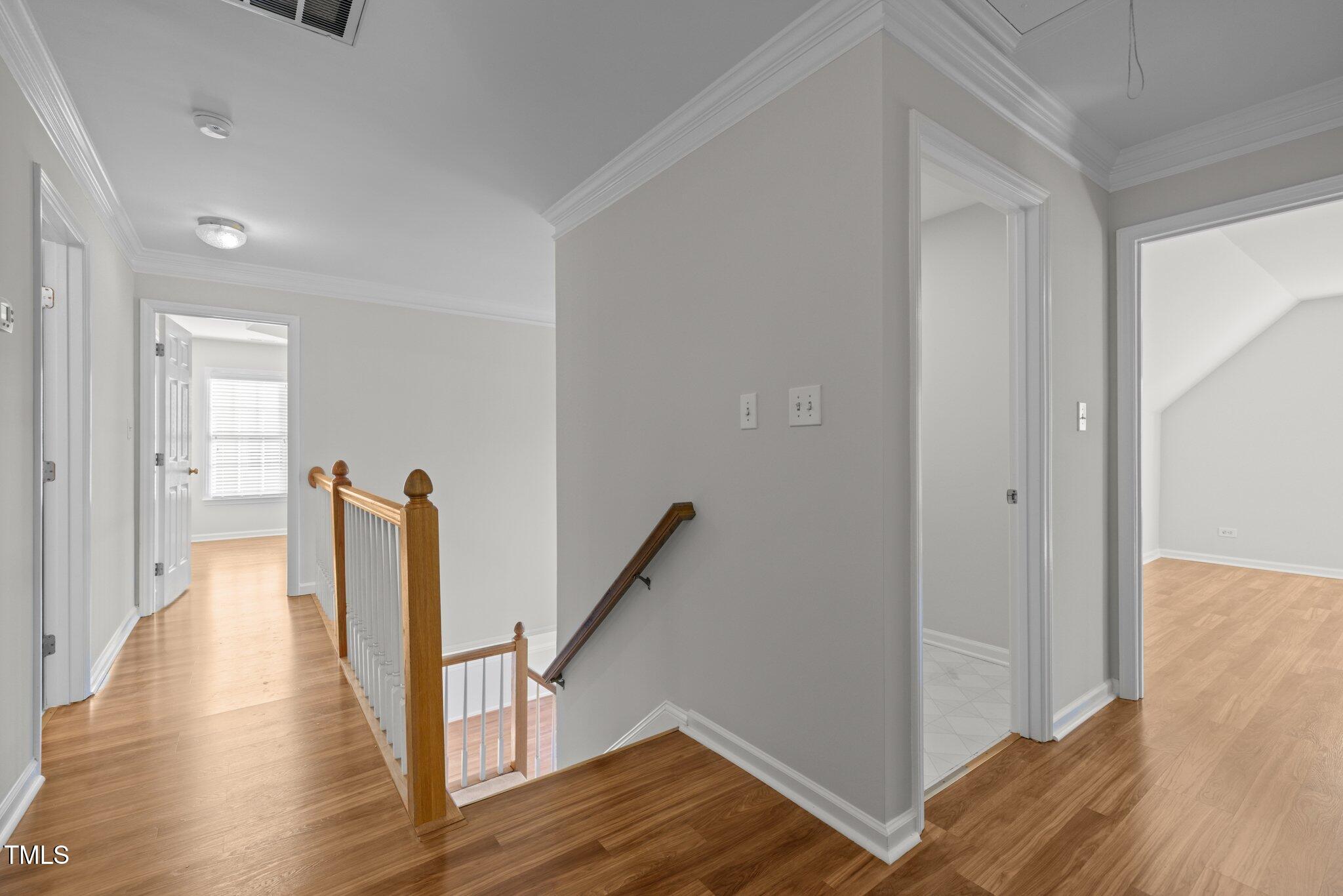 2309 Clerestory Place Raleigh, NC 27615 - Photo 17 of 37 a view of entryway with wooden floor