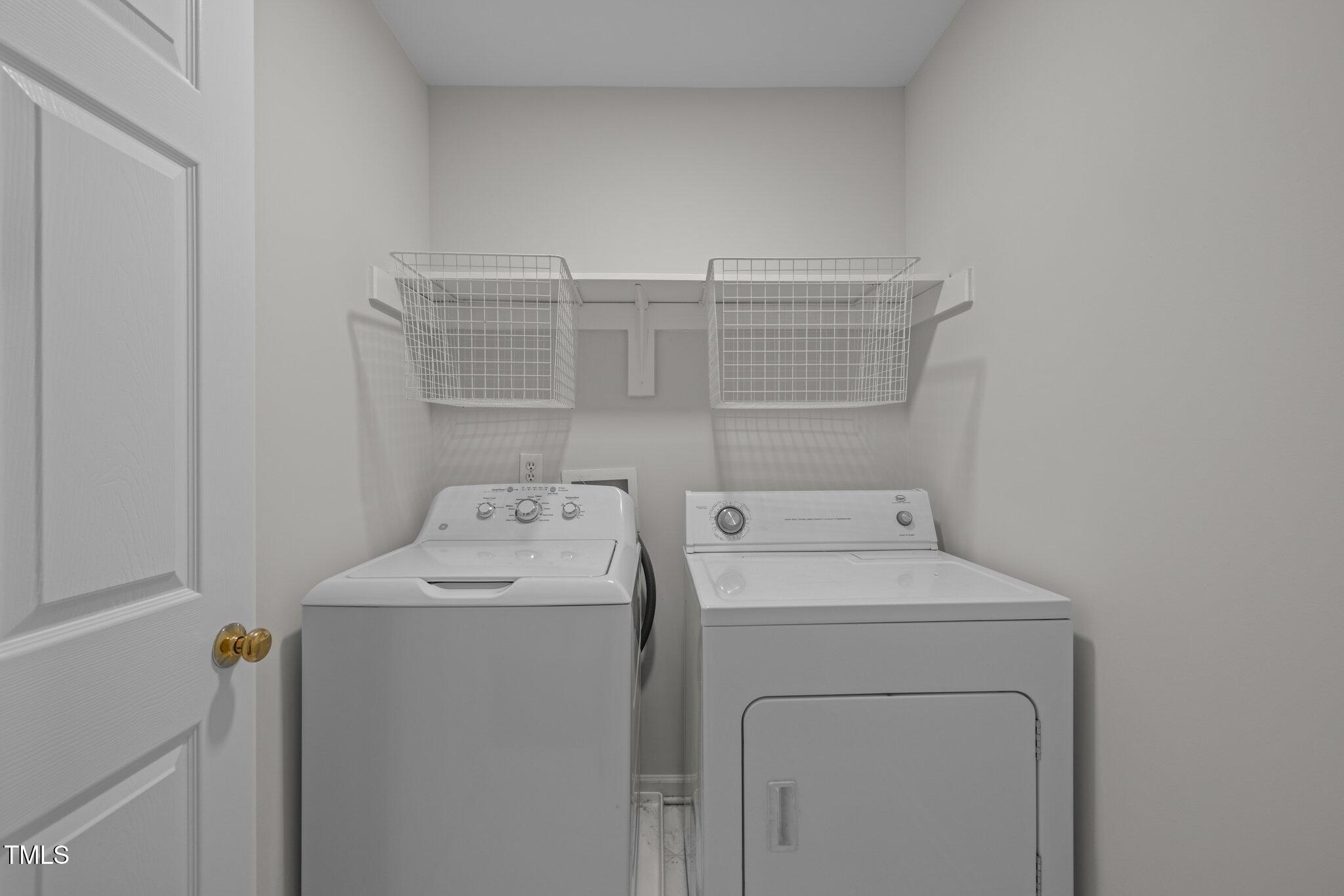 2309 Clerestory Place Raleigh, NC 27615 - Photo 29 of 37 a utility room with dryer and washer