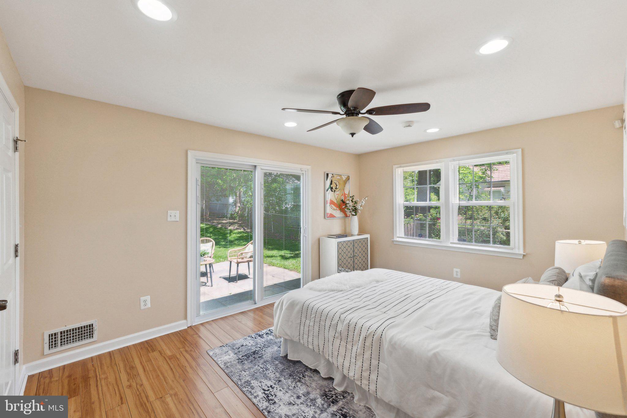 2621 Terrapin Road Silver Spring, MD 20906 - Photo 15 of 26 a spacious bedroom with a large bed and a window