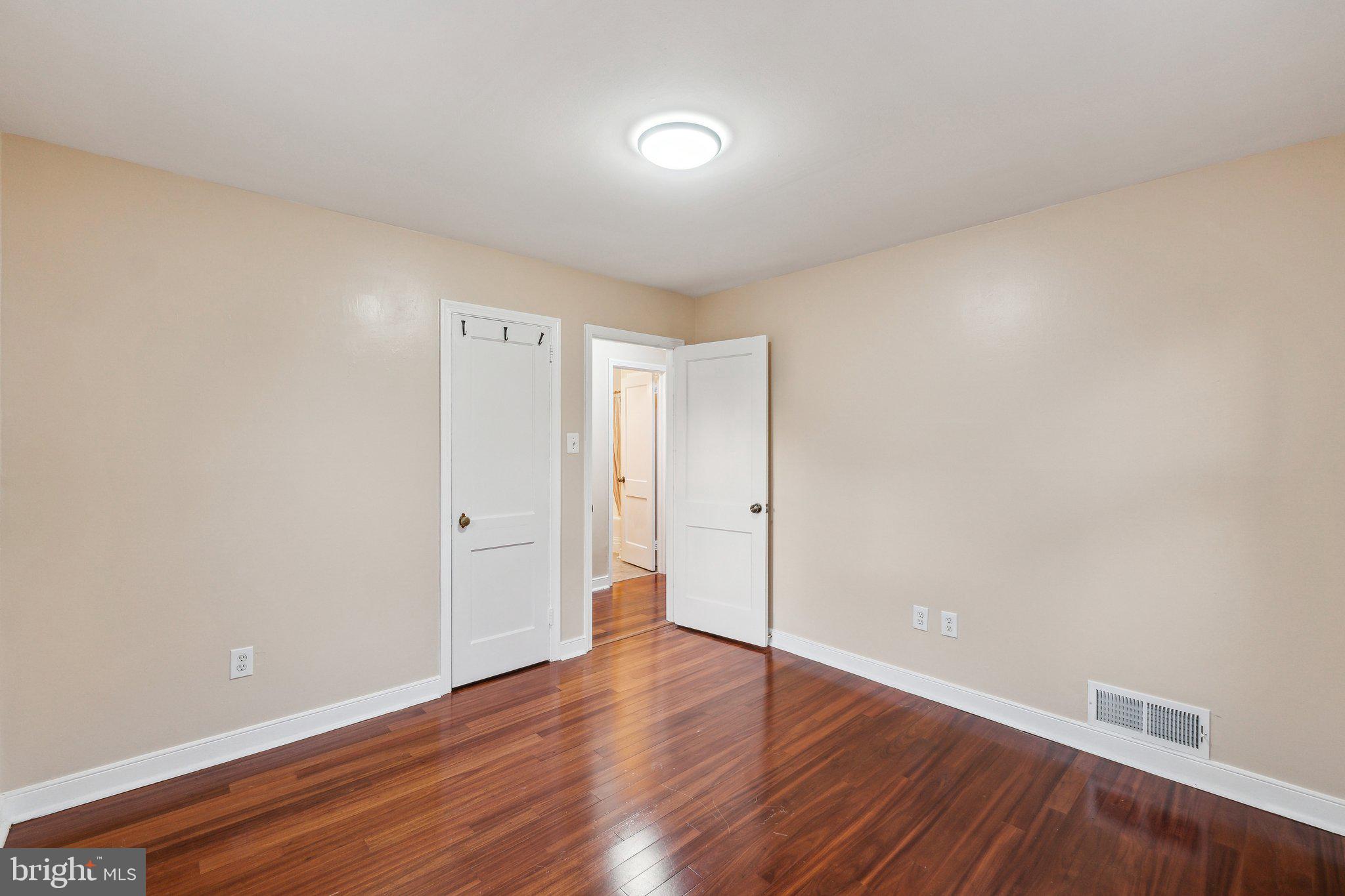 2621 Terrapin Road Silver Spring, MD 20906 - Photo 19 of 26 a big room with wooden floor and closet