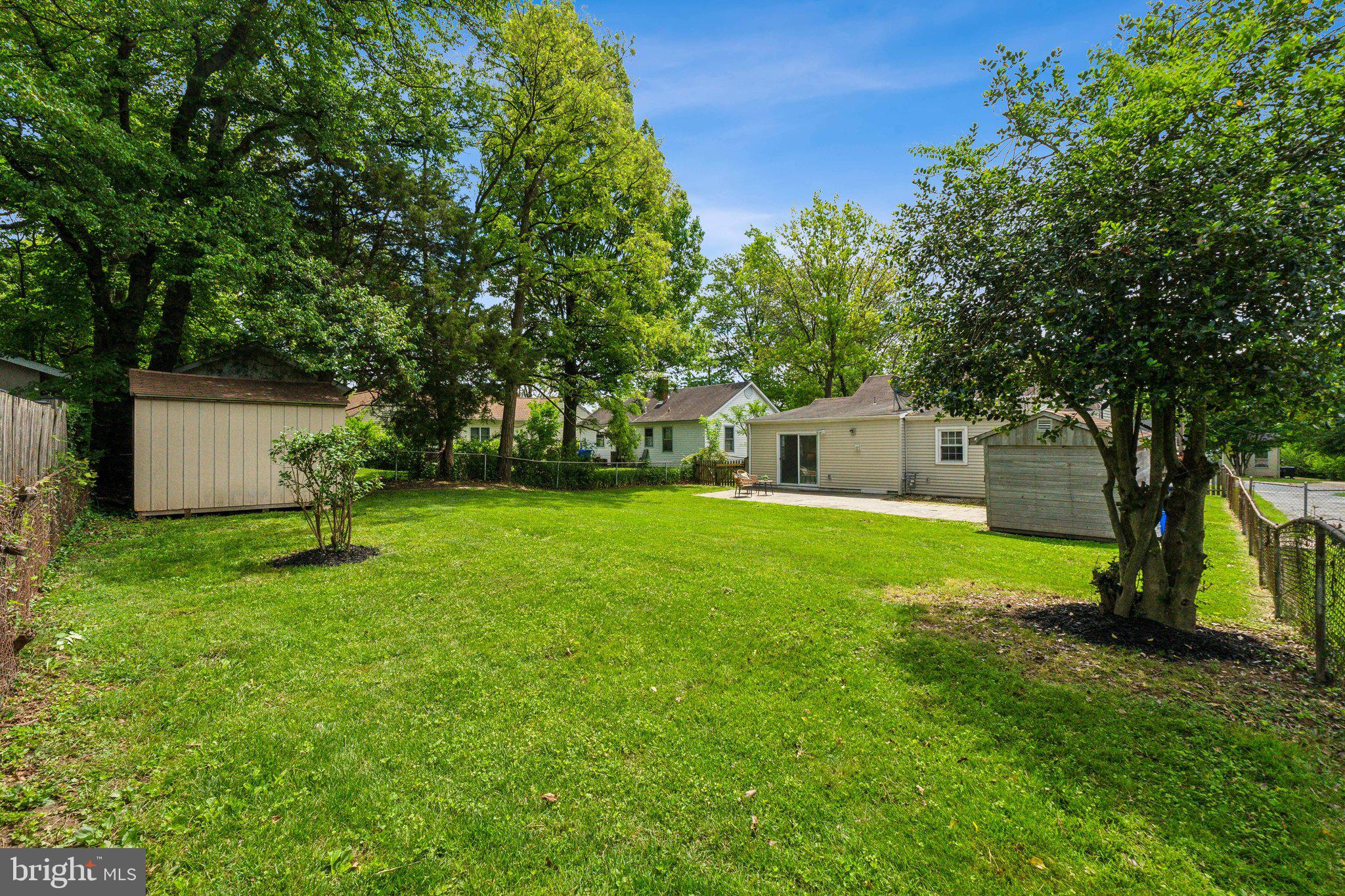2621 Terrapin Road Silver Spring, MD 20906 - Photo 25 of 26 a view of a house with backyard and a tree