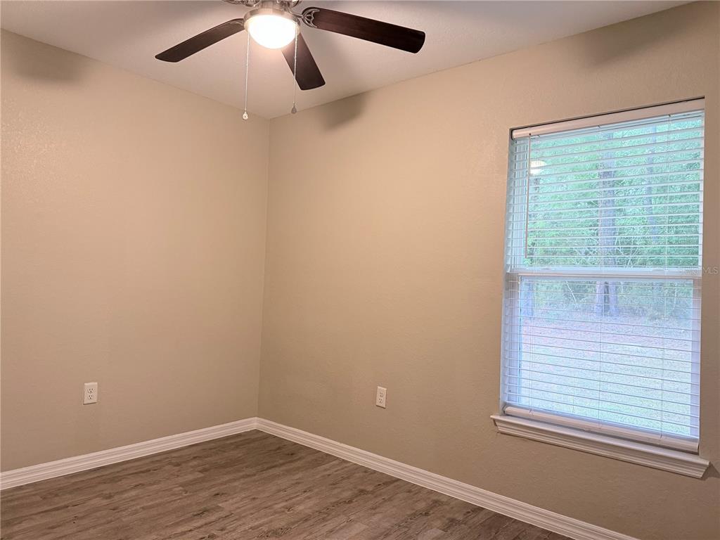 14445 Southwest 22nd Place Ocala, FL 34481 - Photo 9 of 11 an empty room with a window