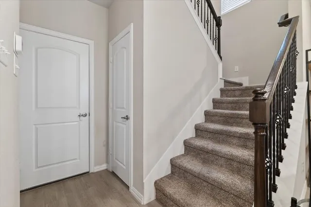 a view of staircase with white walls and white walls
