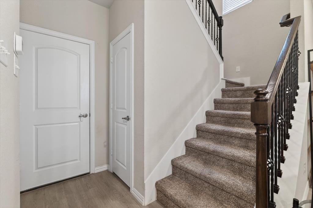 2200 Davenport Drive Denton, TX 76207 - Photo 11 of 23 a view of staircase with white walls and white walls