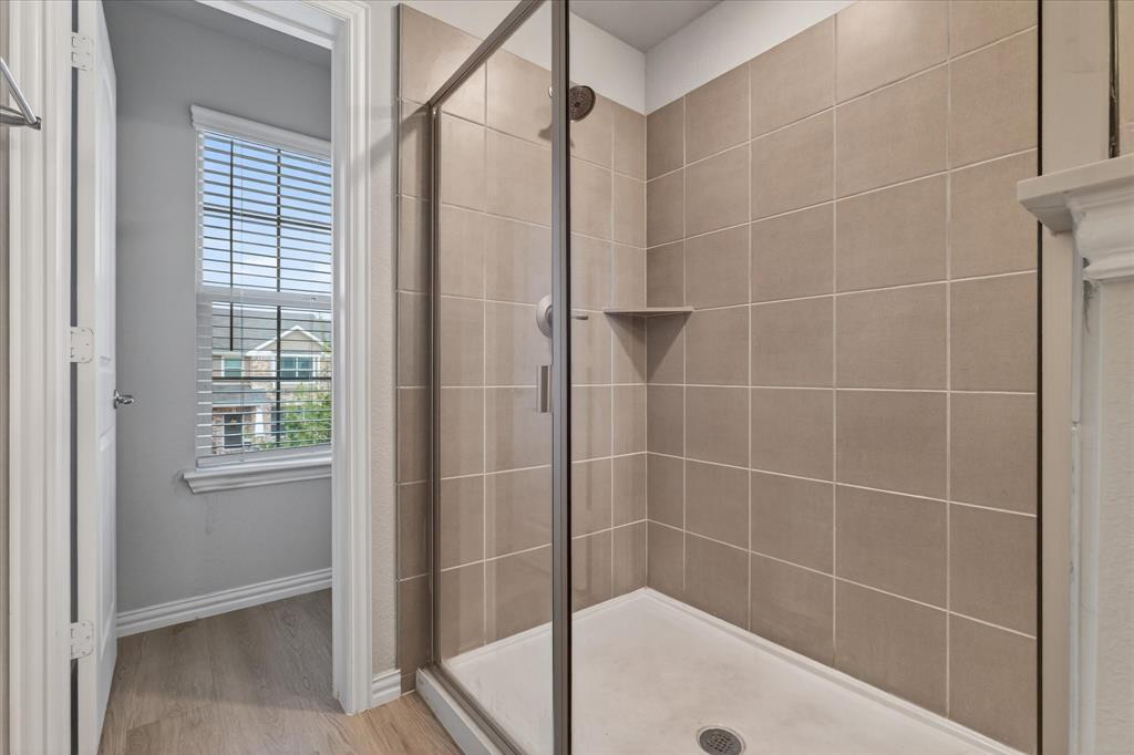 2200 Davenport Drive Denton, TX 76207 - Photo 16 of 23 a bathroom with a shower
