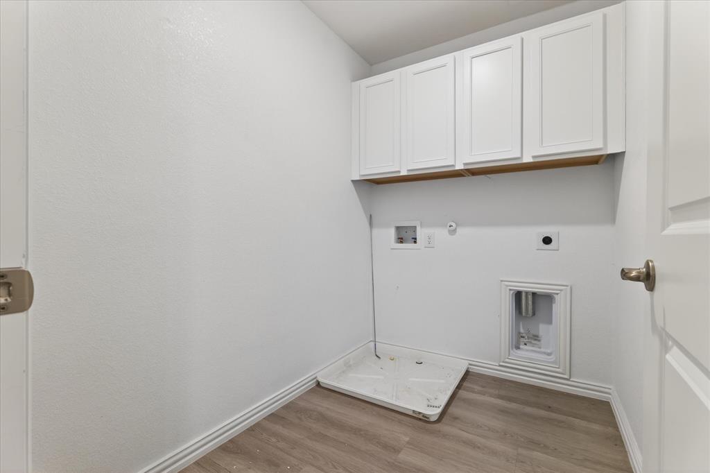 2200 Davenport Drive Denton, TX 76207 - Photo 22 of 23 a view of a storage and utility room
