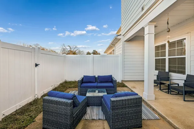 a bedroom with a bed and a fireplace
