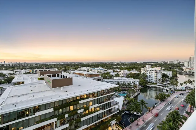 a bedroom with a bed and a desk