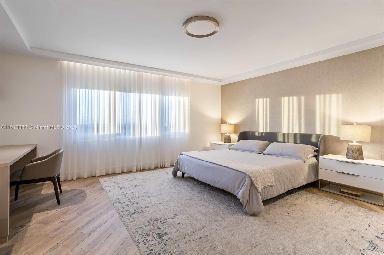 2301 Collins Avenue, Unit 1432 Miami Beach, FL 33139 - Photo 32 of 63 a spacious bedroom with a bed and a window