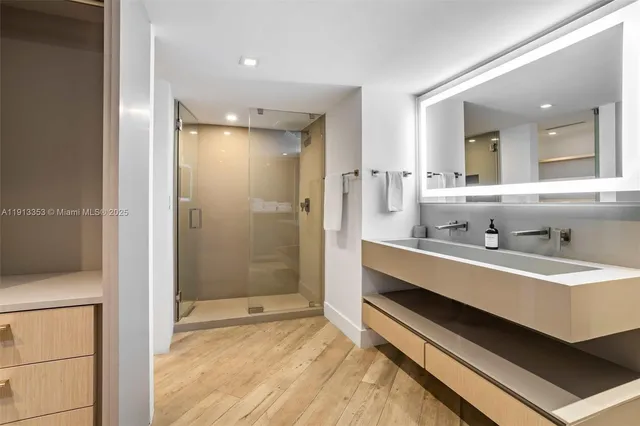 a view of living room with furniture and flat screen tv
