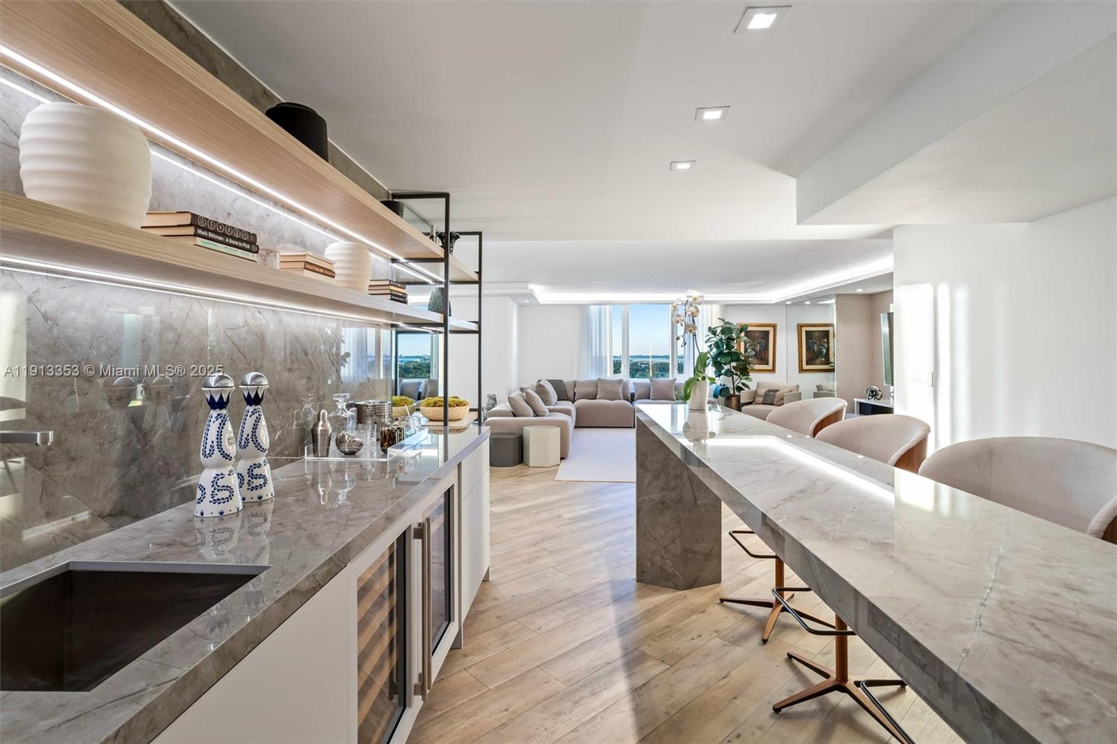 2301 Collins Avenue, Unit 1432 Miami Beach, FL 33139 - Photo 44 of 63 a kitchen with counter top space a sink and appliances