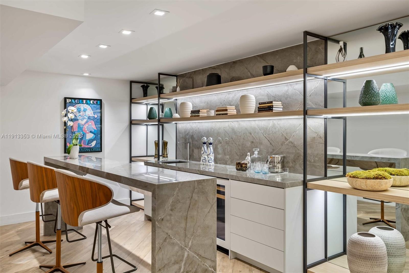 2301 Collins Avenue, Unit 1432 Miami Beach, FL 33139 - Photo 49 of 63 a kitchen with a sink cabinets and window