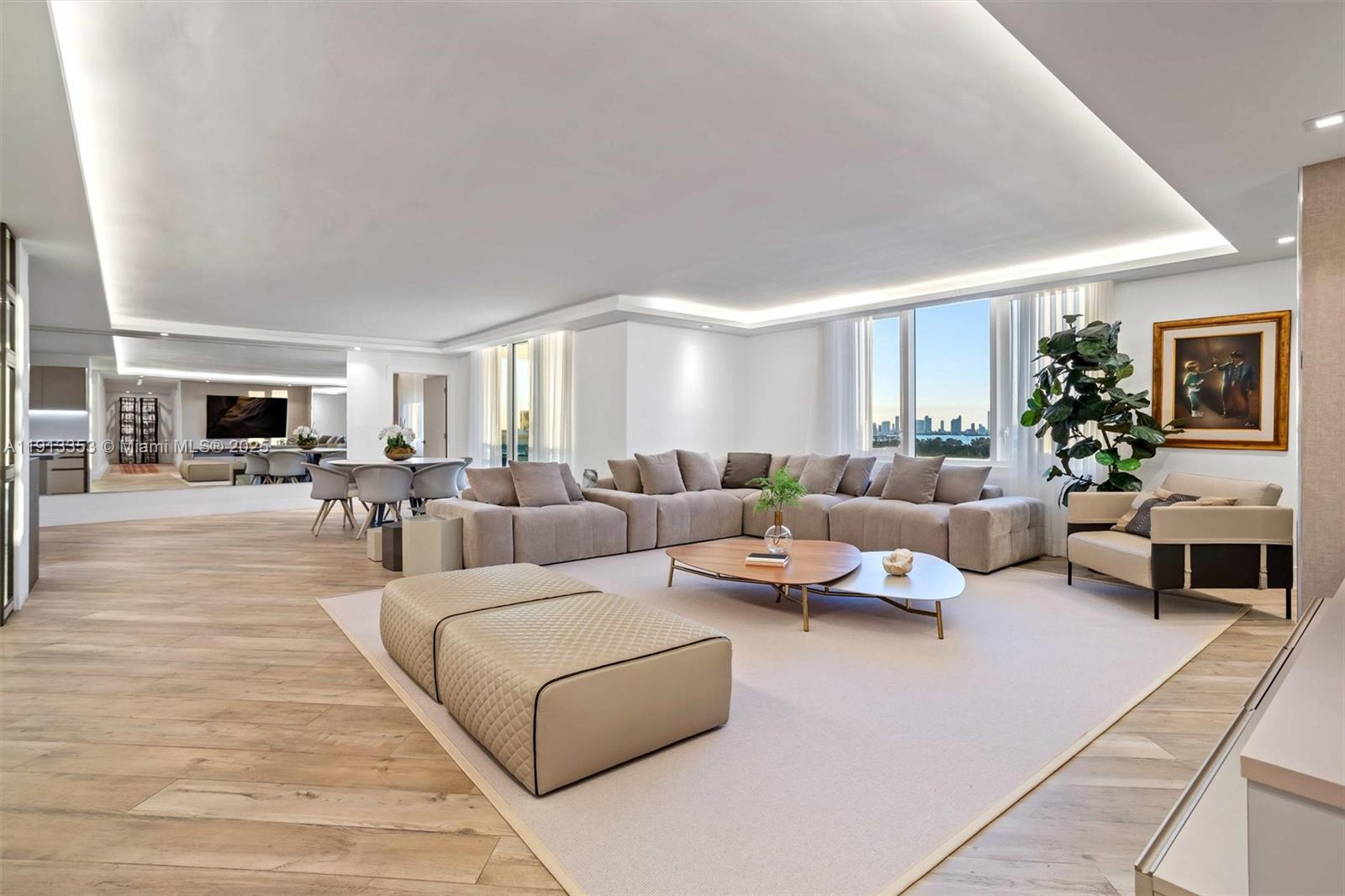 2301 Collins Avenue, Unit 1432 Miami Beach, FL 33139 - Photo 59 of 63 a living room with furniture and a fireplace