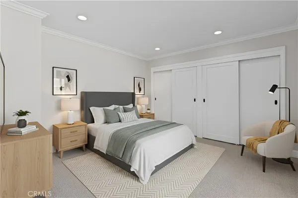 a bedroom with a bed and furniture