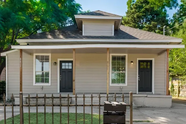 a front view of a house with a balcony